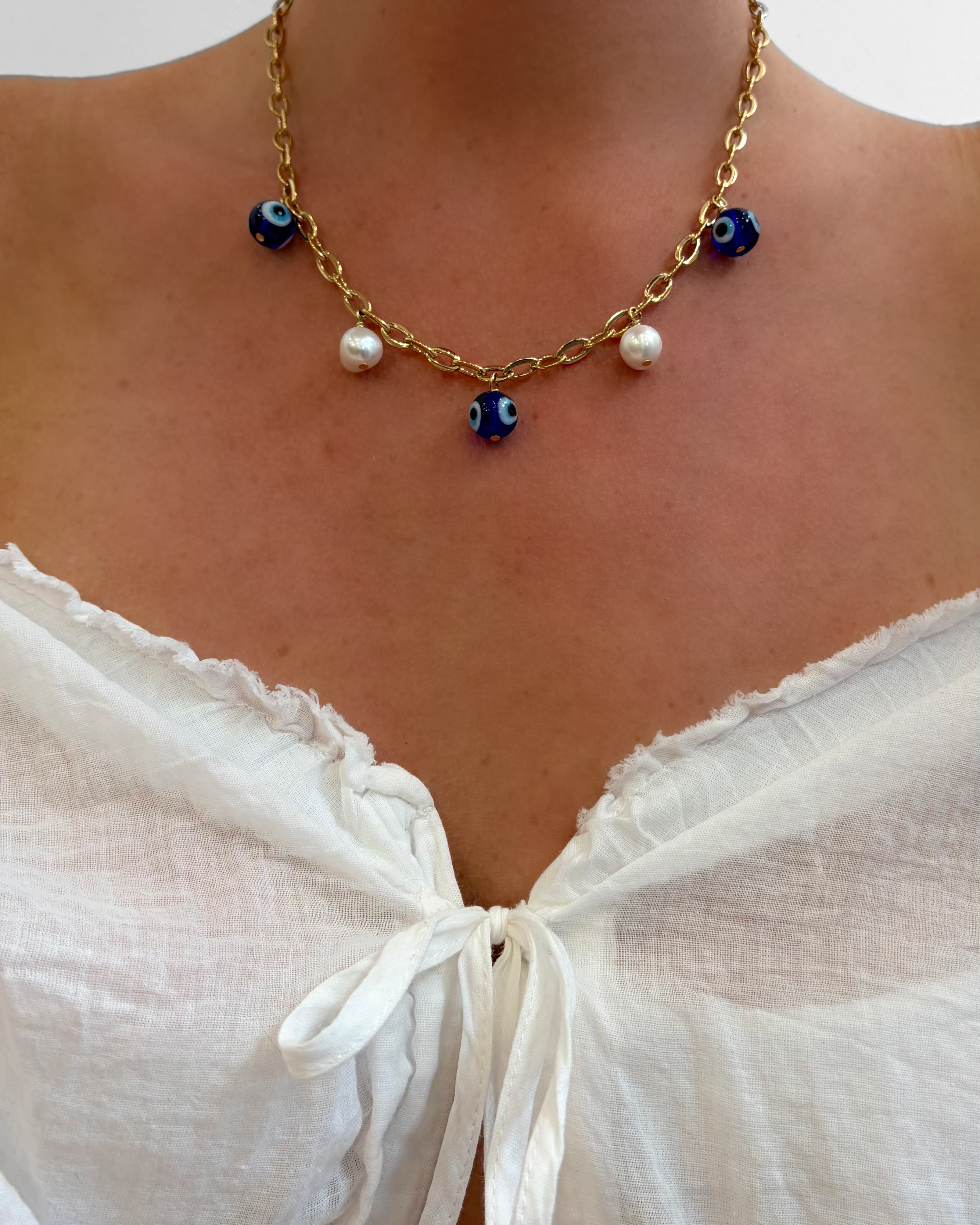 COLLIER EYES