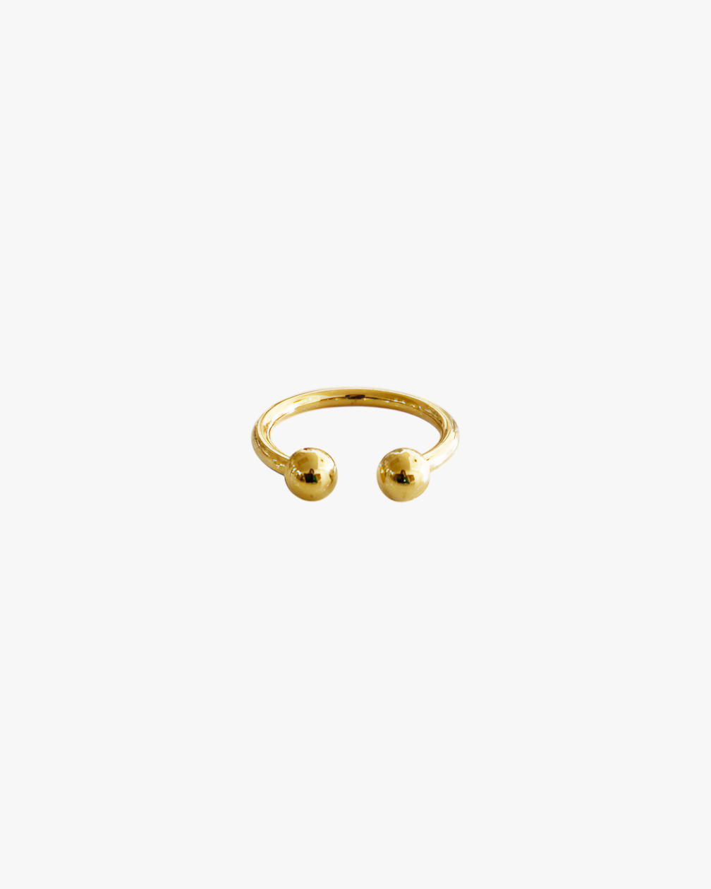 Bague piercing HELLES ajustable en laiton doré à l'or fin 24 carats avec deux petites boules aux extrémités